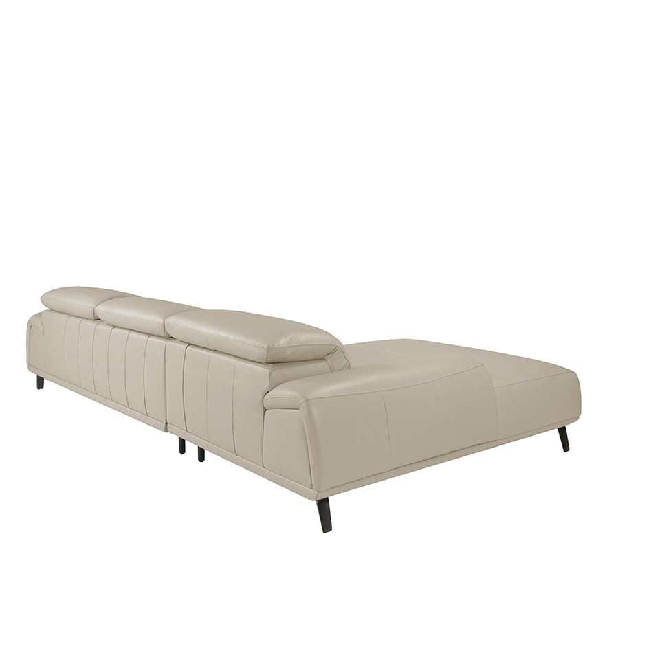 Sofá con chaise longue de piel de vaca en tono taupe de Angel Cerdá