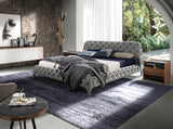 Cama doble tapizado en tela gris y estructura de madera de pino Angel Cerdá
