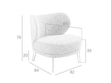 Sillón tapizado en material marrón Vello de Angel Cerdá